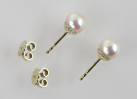 Vintage gouden oorknoppen met zachtroze parel
