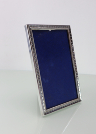 Zilveren fotolijstje, Hooijkaas