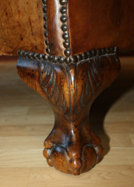 Antieke lederen clubfauteuil