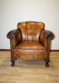 Antieke lederen clubfauteuil