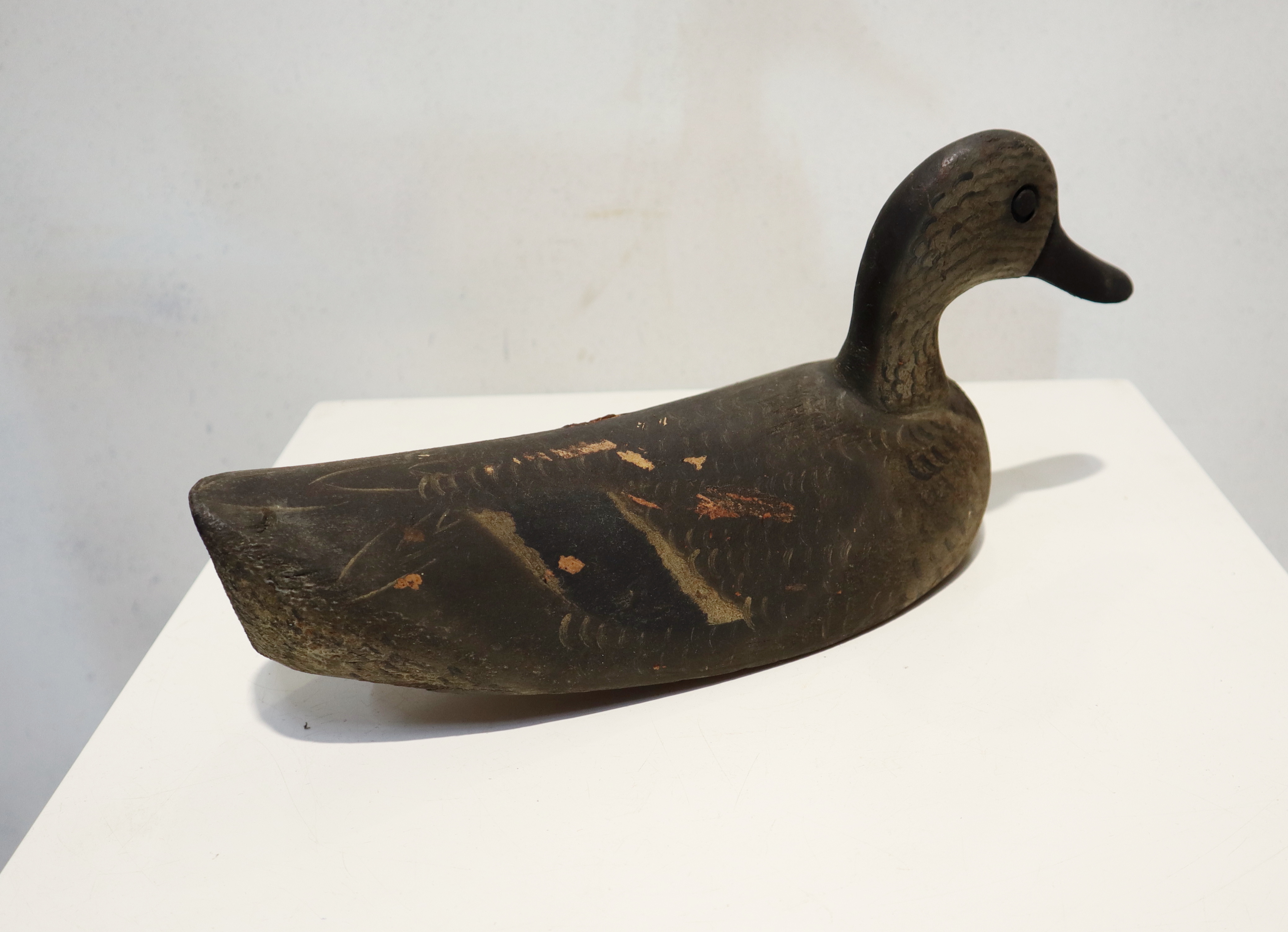 Oude houten lokeend