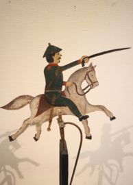 Antieke tuimelaar man te paard