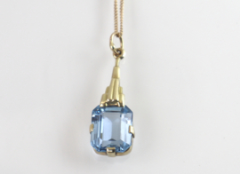 Art Deco gouden hanger blauwe spinel aan collier