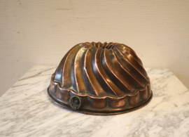Antieke koperen puddingvorm, tulband