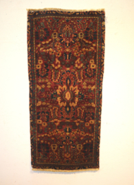 Perzisch kleedje 51 x 114 cm.