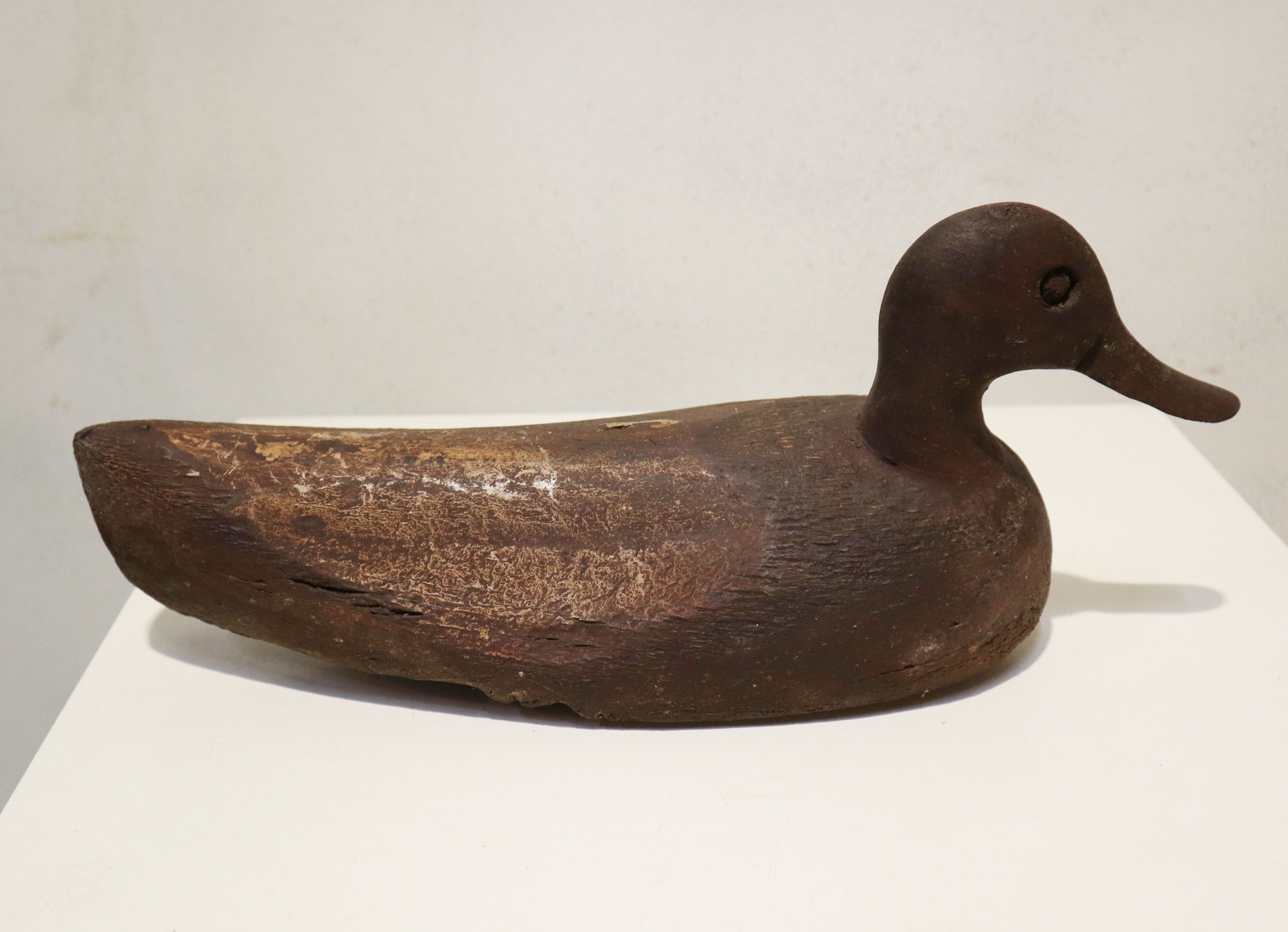 Oude houten lokeend