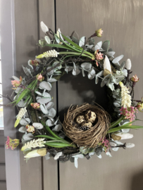 Voorjaarskrans met kunstbloemen