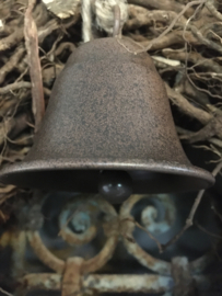 Metalen klokje, roest