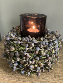 Taartje, nestje van dadeltakjen met windlichtje