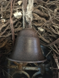 Metalen klokje, roest