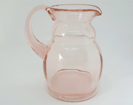 Vintage of brocante kan van roze persglas