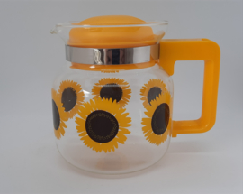 Vintage glazen theepot met zonnebloemen