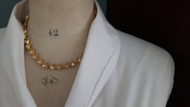 Goudkleurige ketting met armband