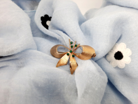 Goudkleurig jaren '60 broche met blauwe strass