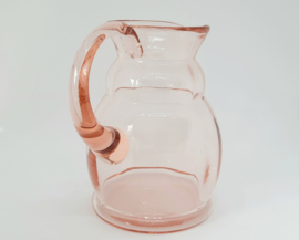 Vintage of brocante kan van roze persglas