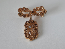 Vintage goudkleurige strass broche