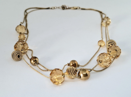 Vintage ketting met goudkleurige bolletjes