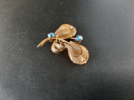 Jaren '50 broche, goudkleurig met aurora borealis