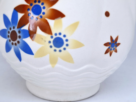 Brocante kan met bloemen, Annaburg, Duitsland