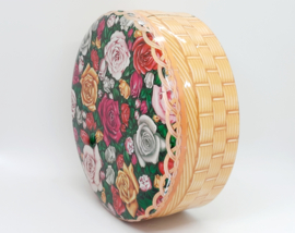 Vintage koekblik met rozen
