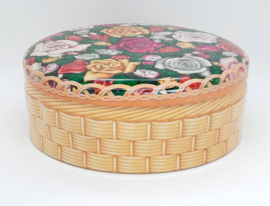 Vintage koekblik met rozen