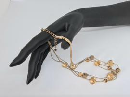 Vintage ketting met goudkleurige bolletjes