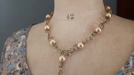 Monet parelketting met vergulde schakels