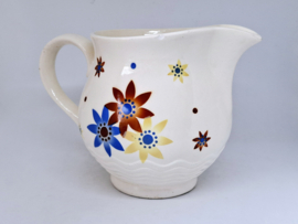 Brocante kan met bloemen, Annaburg, Duitsland