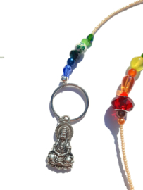 Suncatcher met regenboogkralen en Boeddha