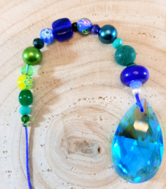 Suncatcher met blauw koord, zeester en klavertje vier