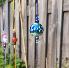 Suncatcher met blauw koord, zeester en klavertje vier