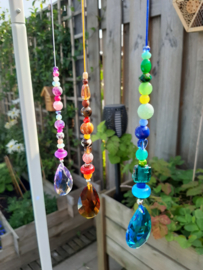 Suncatcher met bruine kralen en Ohm hanger