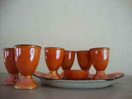 Vintage oranje eierdopjes met onderschaaltje - VERKOCHT