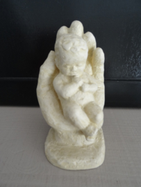 Beeldje baby op hand - VERKOCHT