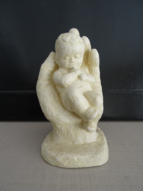 Beeldje baby op hand - VERKOCHT