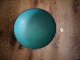 Blauwe schaal met bolle onderkant