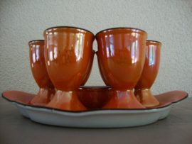 Vintage oranje eierdopjes met onderschaaltje - VERKOCHT