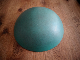 Blauwe schaal met bolle onderkant