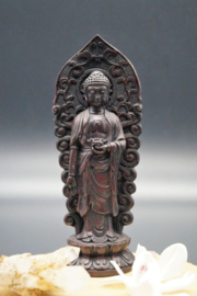 Standing Buddha on lotus flower