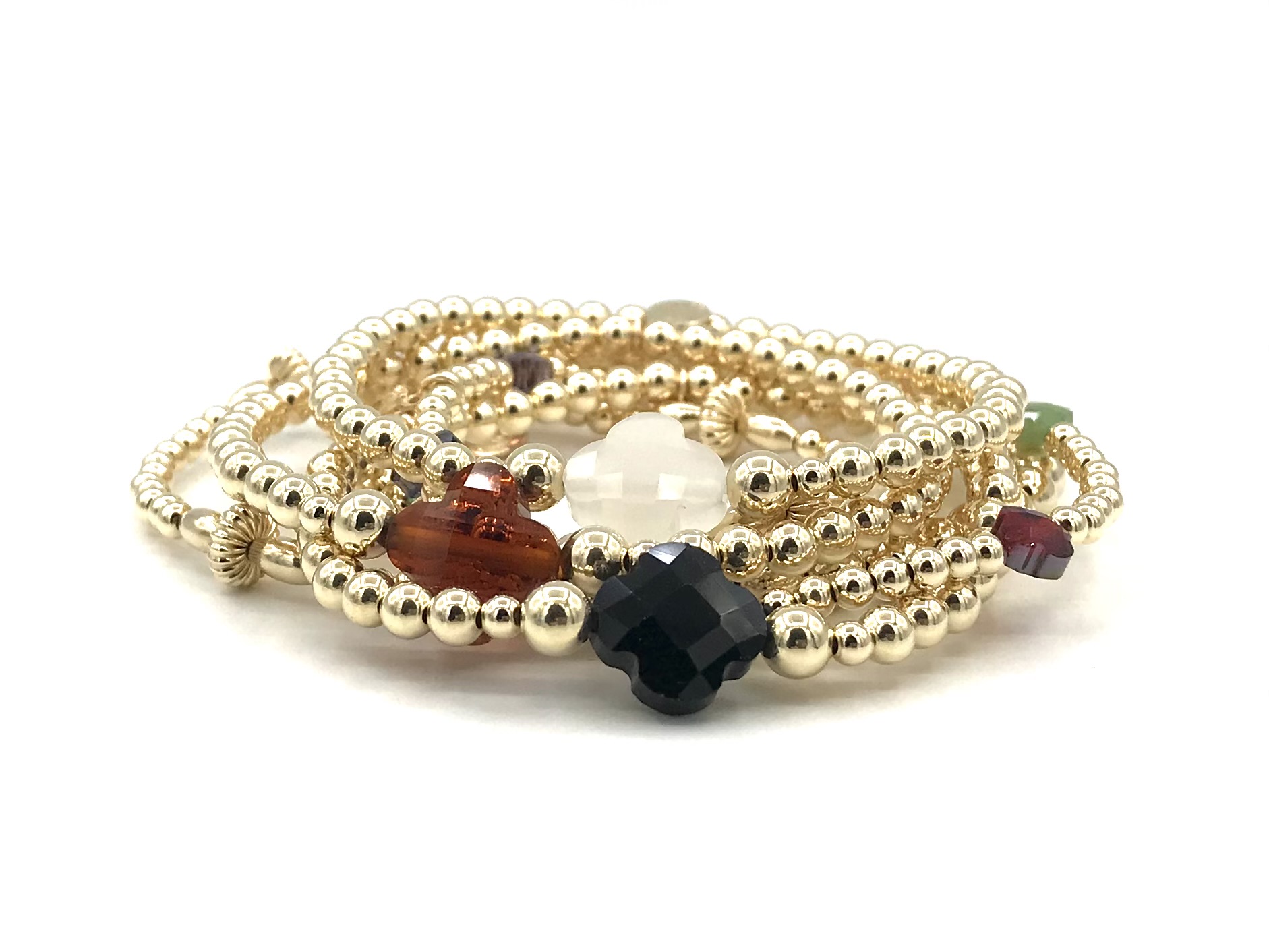Armband Lizzie black met goudkleurige real gold plated balletjes en zwart klavertje