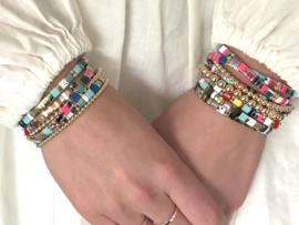 Armband Tila sparkle IV met gold plated balletjes en bruin/blauwe edelstenen