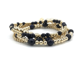 Armband Vesper met real gold plated balletjes en donkerblauw goudsteen