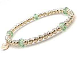 Armband Elynn met groen Swarovski crystal en real gold plated balletjes