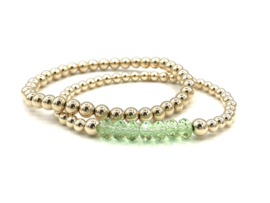 Armband Claire met groen Swarovski crystal en real gold plated balletjes