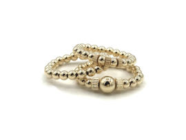 Stretch ring Jaelynn met real gold plated geribbelde wieltjes en balletjes