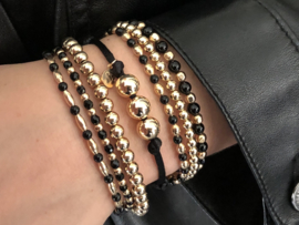 Armband Farah met real gold plated balletjes en facet geslepen zwarte onyx edelstenen