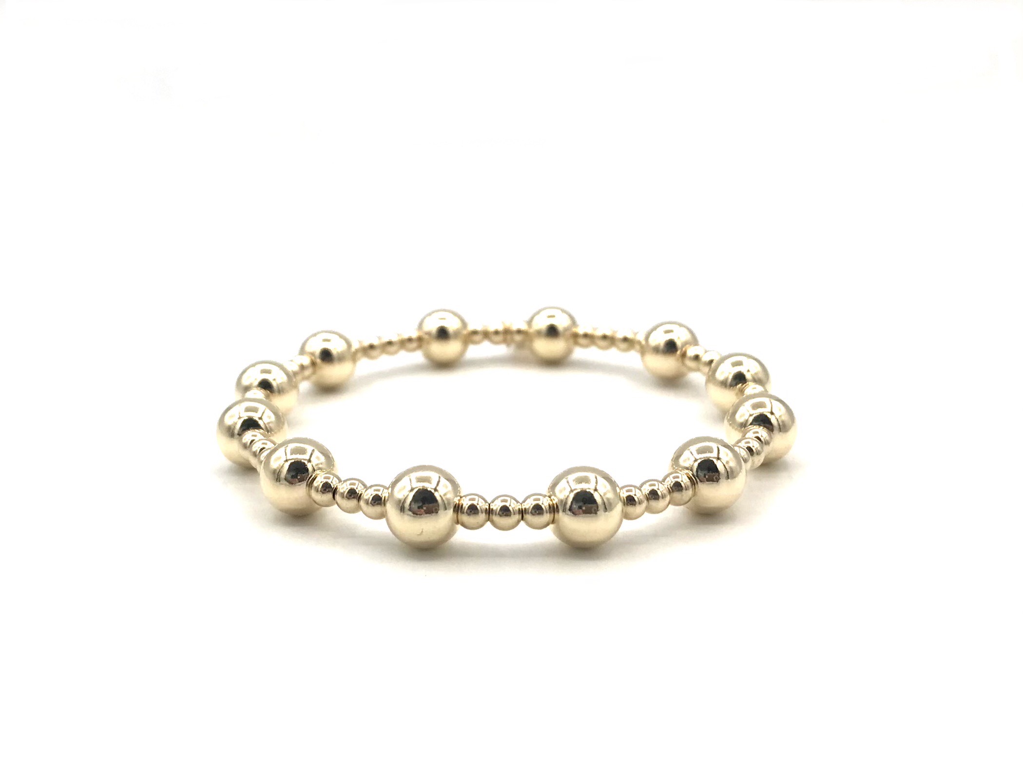 Armband Roxanne met real gold plated balletjes in verschillende groottes