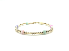 Armband Elodie met luxe parelmoer wieltjes en goudkleurige real gold plated bolletjes