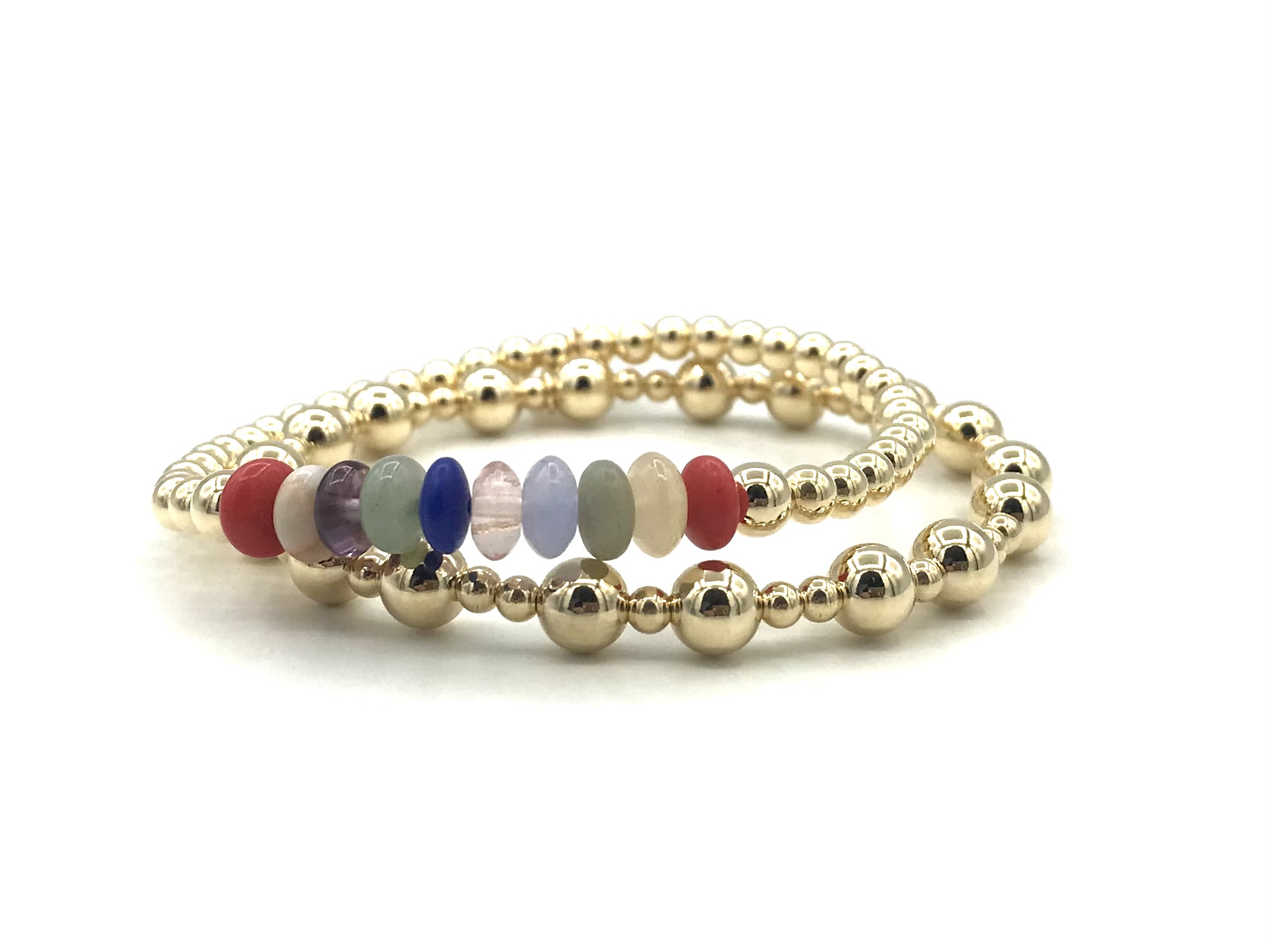 Armband Lonneke met goudkleurige real gold plated balletjes en wieltjes van verschillende edelstenen