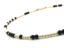 Ketting met real gold plated balletjes en zwarte onyx edelsteen